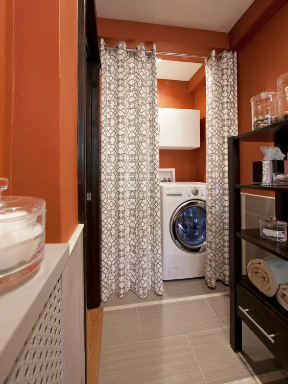 Brilliant tiny laundry room DIY idea for a small laundry area off the kitchen!
