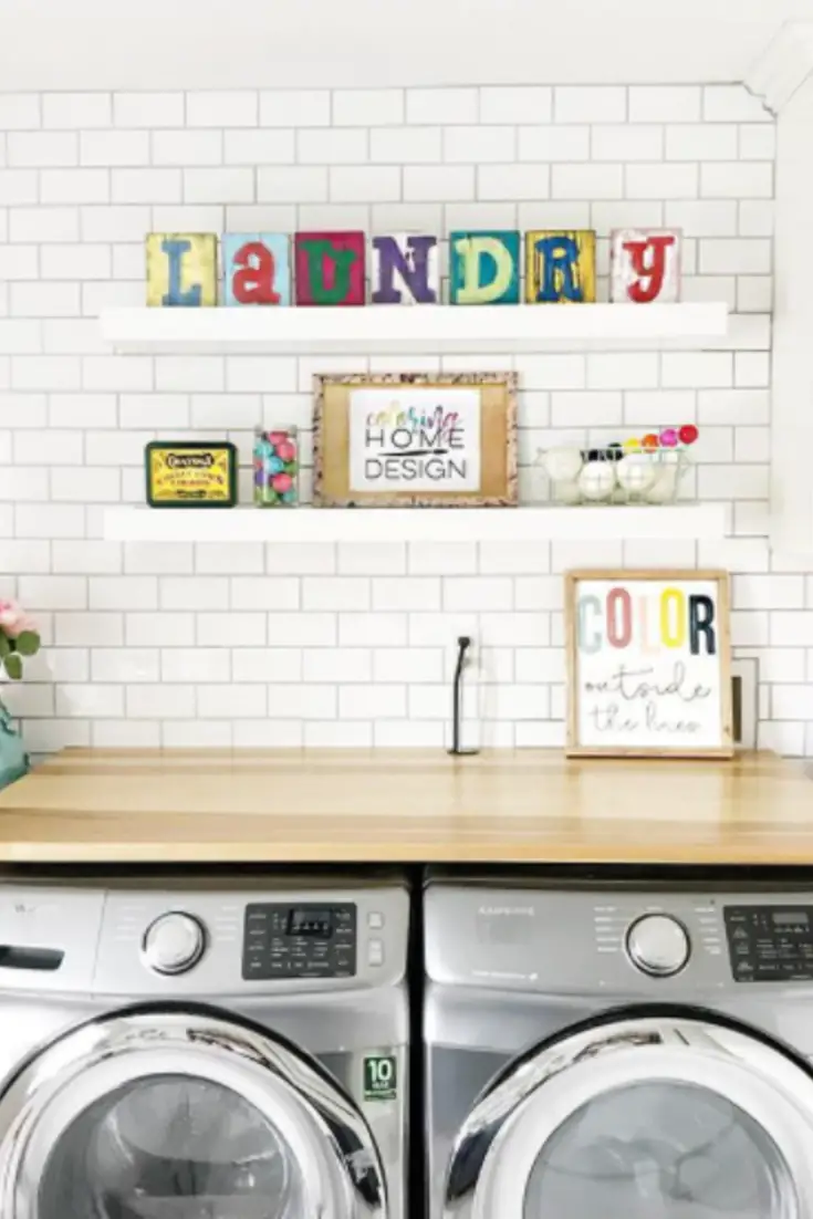 Subway tiles in the laundry room idea - these white subway tiles behind open shelves look gorgeous in a laundry room.