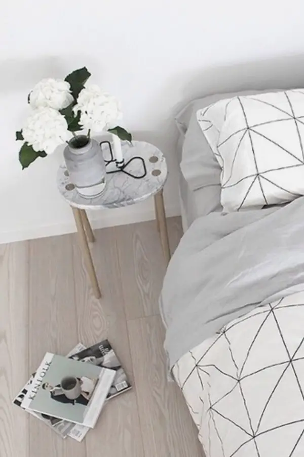 Gray bedroom with minimalist decor - love the simple nightstand