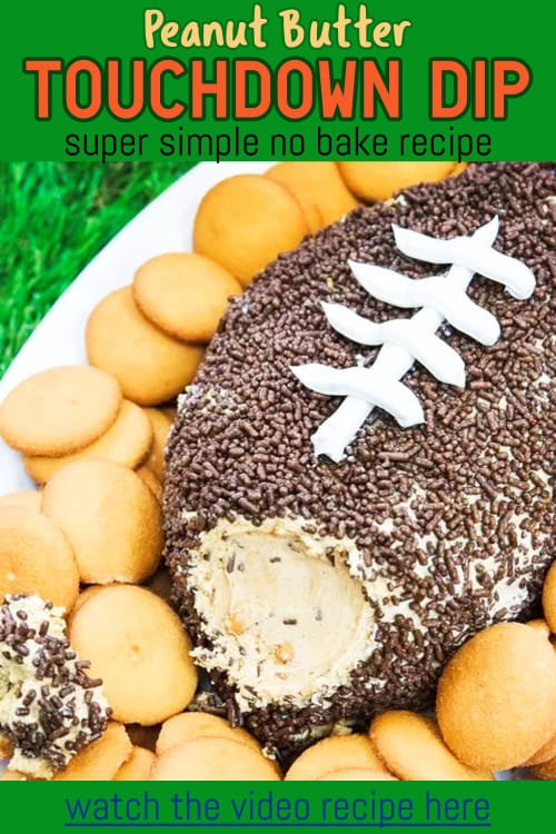 Fingerfood ideas and simple football party food for a crowd!  This no bake football party peanut butter dessert dip is a real crowd pleaser & is perfect for your SuperBowl party crowd.  Lots more easy appetizer ideas & fingerfood recipes here - perfect for a Football Themed Birthday Party, Superbowl Party, Unique Thanksgiving Day fingerfood & snacks ideas, couples coed baby shower dessert table ideas for football fans, Dessert Dips with Cookies, Yummy football shaped peanut butter dip!