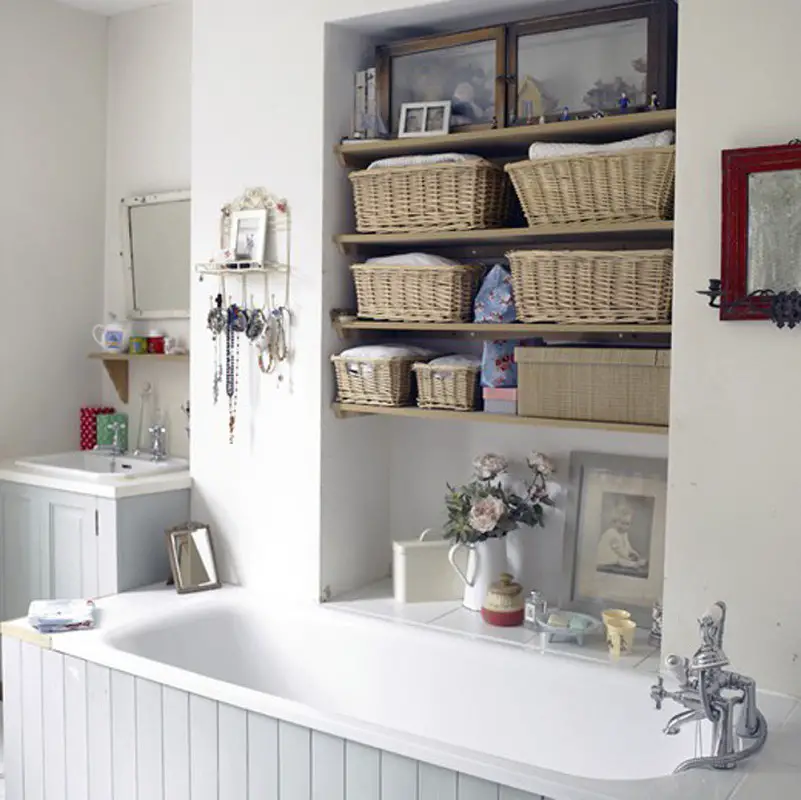 Small Bathroom Shelf Ideas For Creative Bathroom Storage On a Budget - Great idea for shelves over the bathtub in this bathroom. LOVE the baskets!