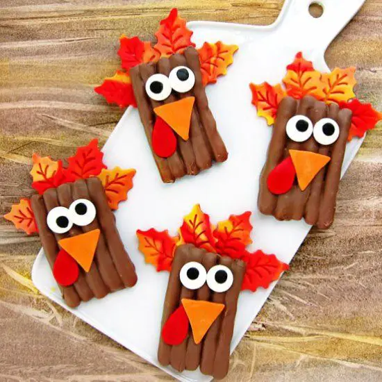 Fall Crafts For Kids of All Ages - Fun and Easy Fall Crafts and Craft Projects for Kids to Make - Fun Fall FOOD Craft for kids - Chocolate Pretzel Turkeys! Easy popsicle stick craft for children