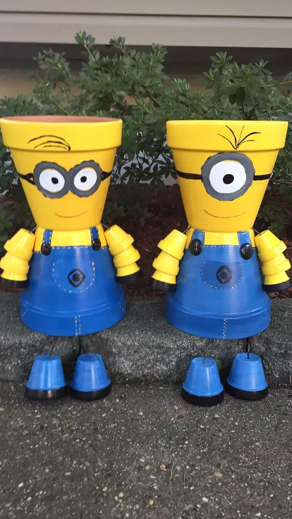 DIY Minion Pot People - How to paint Minion characters from the movie on terra cotta flower pots. Great craft idea for kids