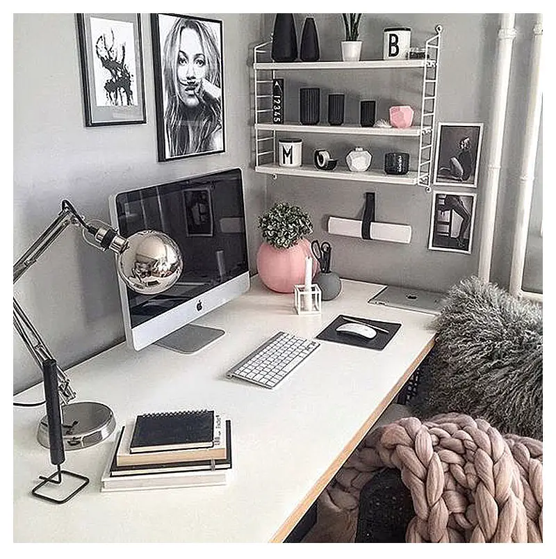 Home office ideas for women - pretty Work from home office ideas for women - This home office workspace makes me happy.  It's not a bright white like the others, but the gray walls in this office paired with the white desk and the pink office decor and feminine office items just bring it all together perfectly.  What a great work from home office idea!
