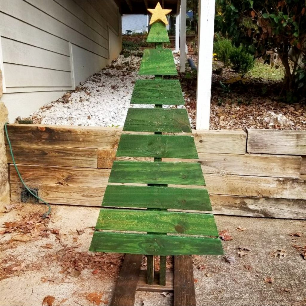 DIY Pallet Christmas Tree Ideas - We Tried It!  Make a Christmas tree from old pallets (tutorial video too)... painted ideas, with lights, decorated, indoors and outdoors ideas for front porches at Xmas.