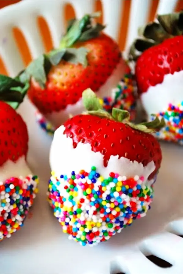 Summer Cookout and BBQ party food ideas - dip fruit in whipped cream or yogurt then dip in sprinkles