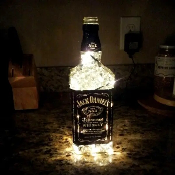 Jack Daniels Bottle Crafts - DIY glowing Jack Daniels lamp with string lights (fairy lights)