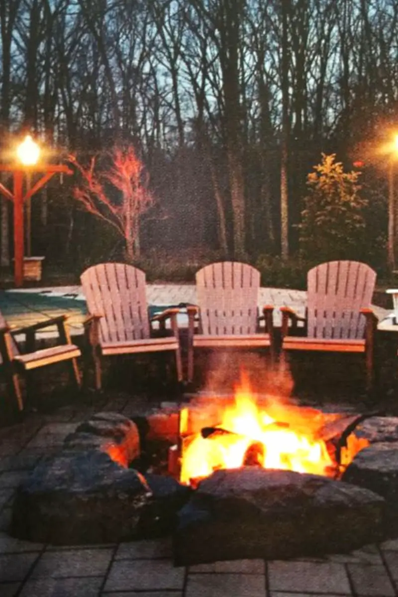 Simple firepit seating idea-put inexpensive chairs in a circle around the firepit
