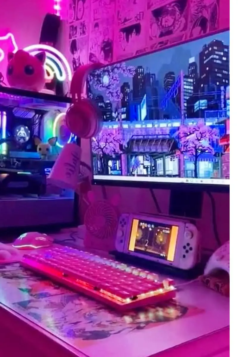 Using neon is a GREAT way to make your bedroom aesthetic like this pink neon gaming desk