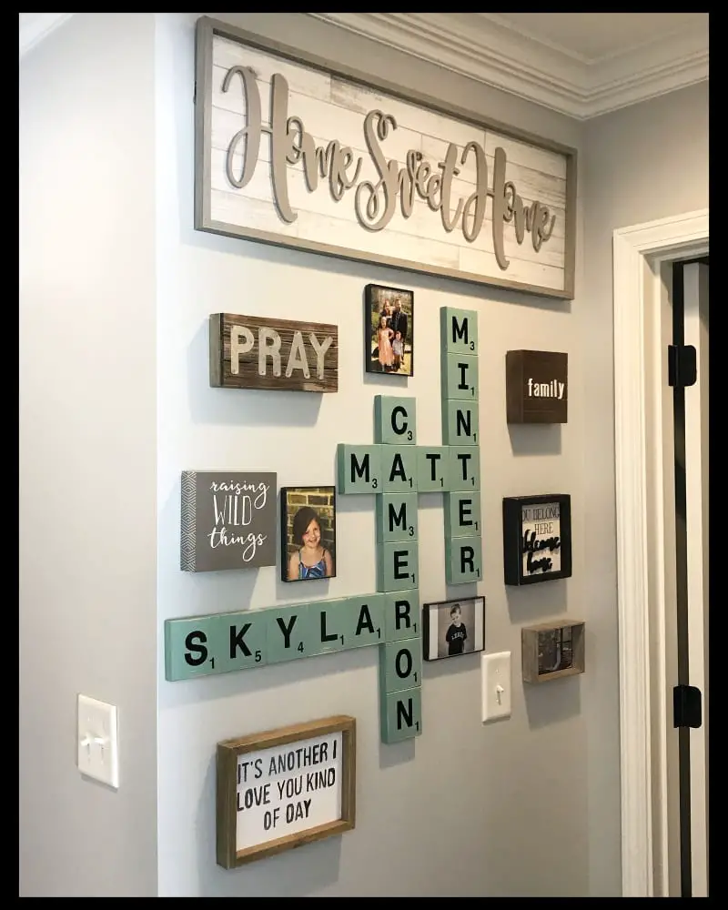 wall decor ideas - narrow hallway wall decorating idea - farmhouse scrabble tile gallery wall for family photos