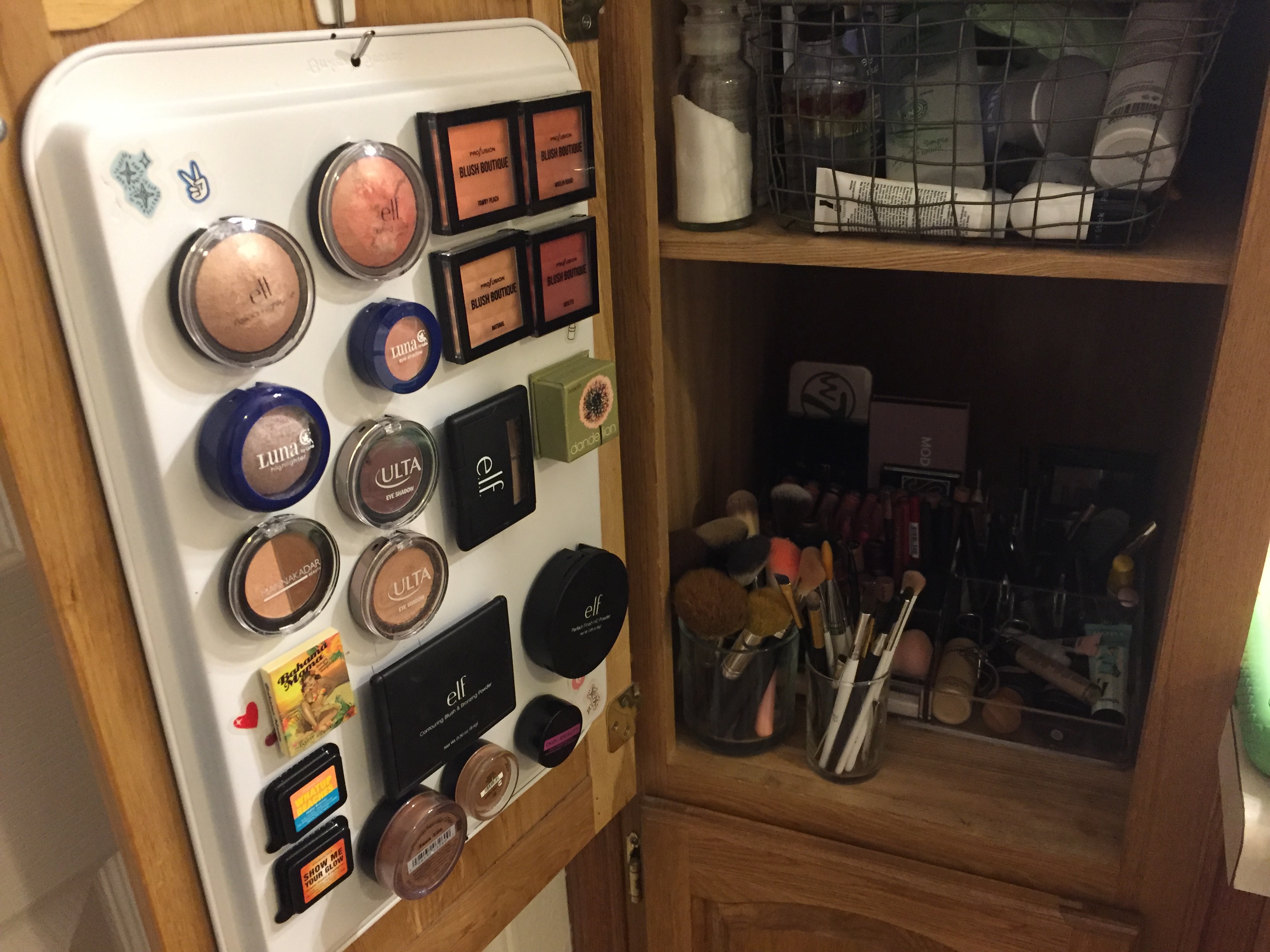 Magnetic makeup storage holder inside cabinet door