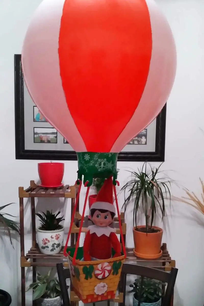 elf come back ideas - elf on the shelf in a hot air balloon toy on Elf's arrival from North Pole