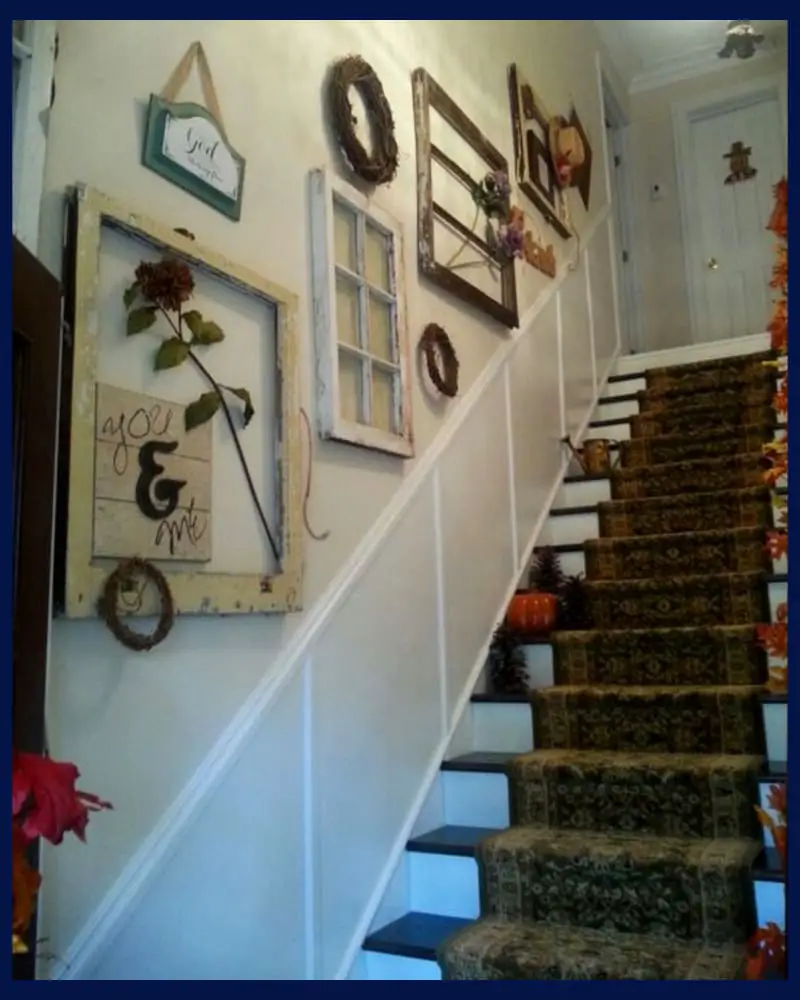 stairway accent wall with old windows