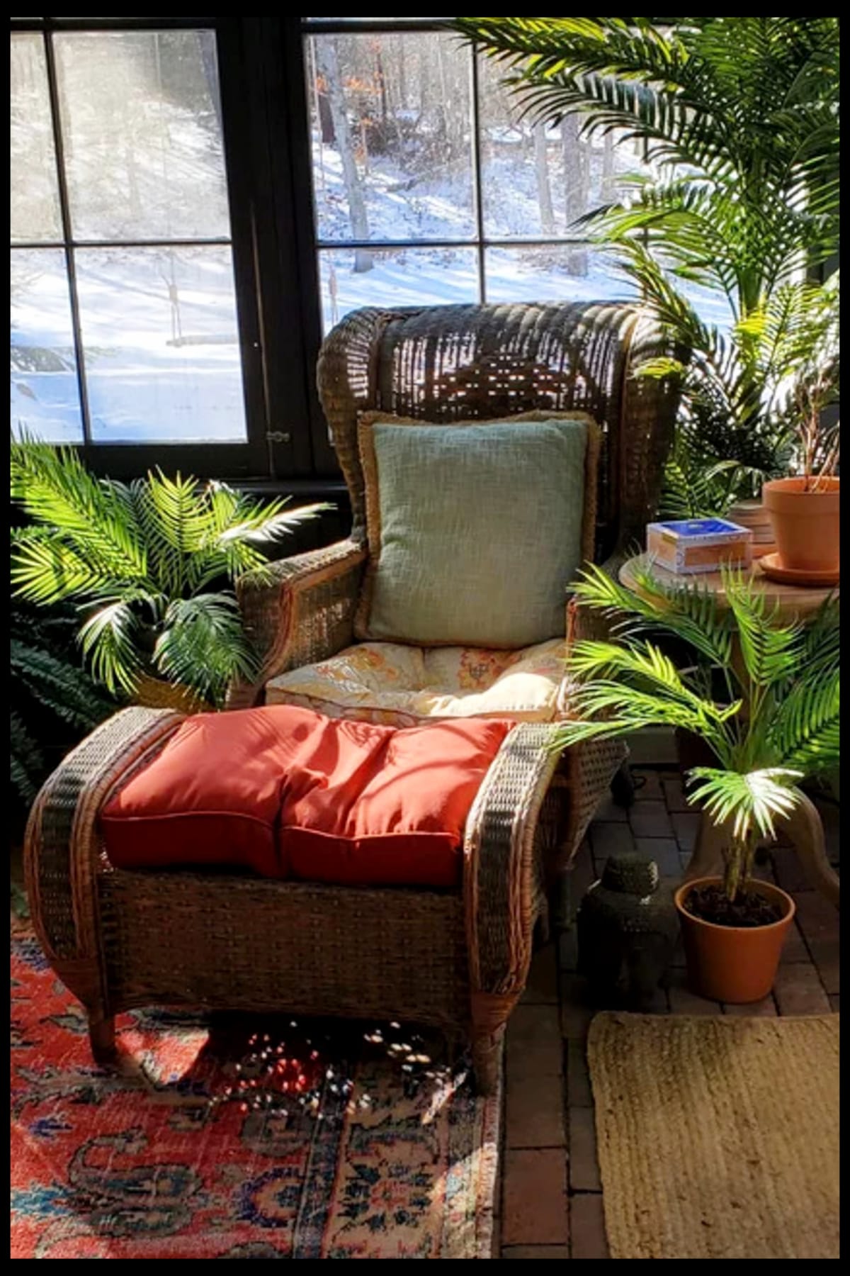 decorating with fake plants - sunroom porch reading nook