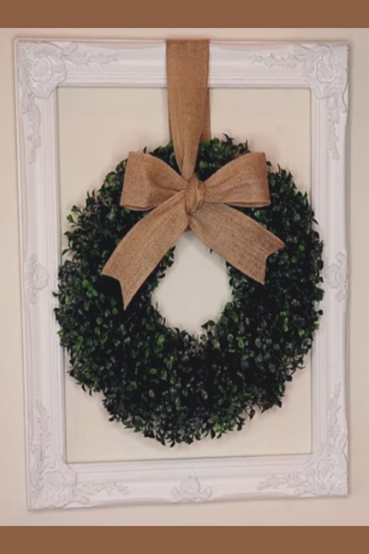 decorating with fake plants - DIY wall decor with artificial wreath in an old repurposed picture frame.