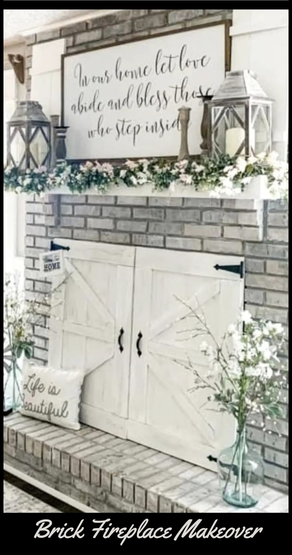 Brick fireplace makeover with farmhouse fireplace decor, fireplace doors that look like barn doors and white washed brick all pulled together with Dollar Tree and Hobby Lobby farmhouse decorations on the mantel and hearth