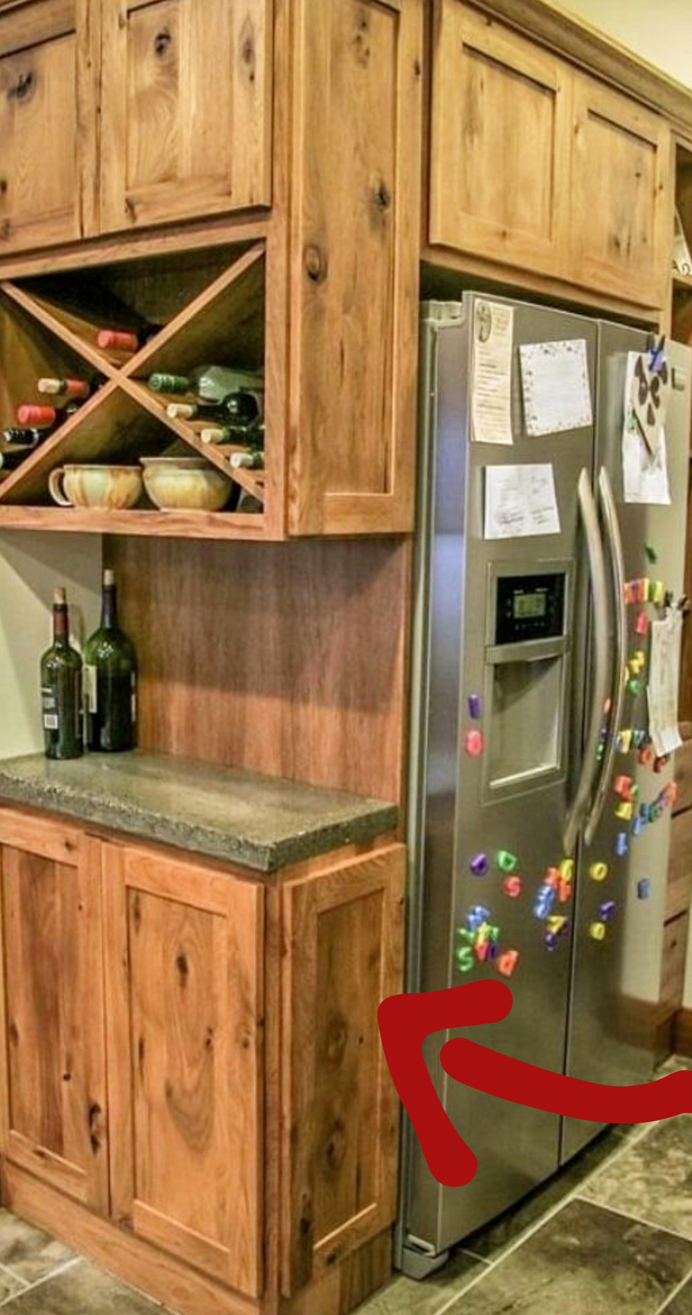 Kitchen DIY project add cabinets around refrigerator to make a dry bar wine rack area